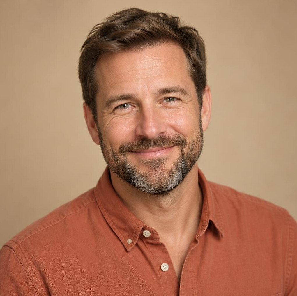 Portrait of a friendly man in his forties with a short beard