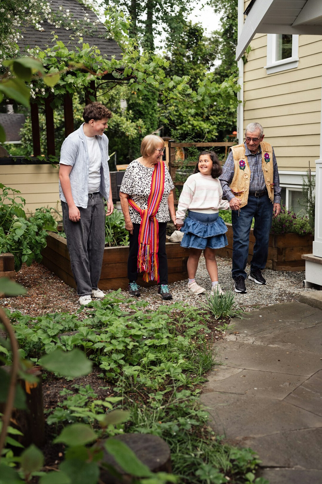 senior friends chatting in garden