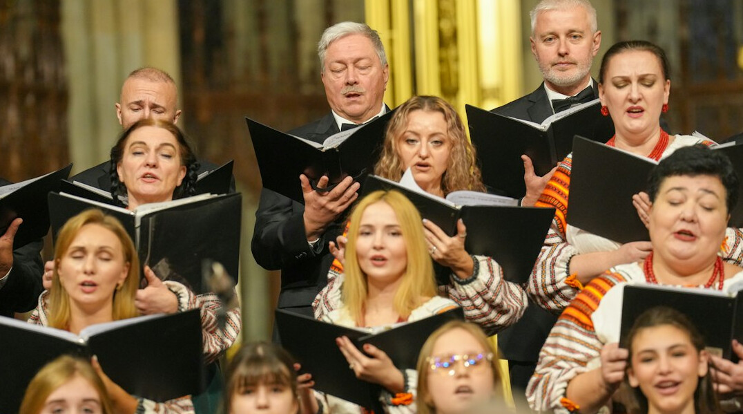 Group of elderly women and men singing together in a choir